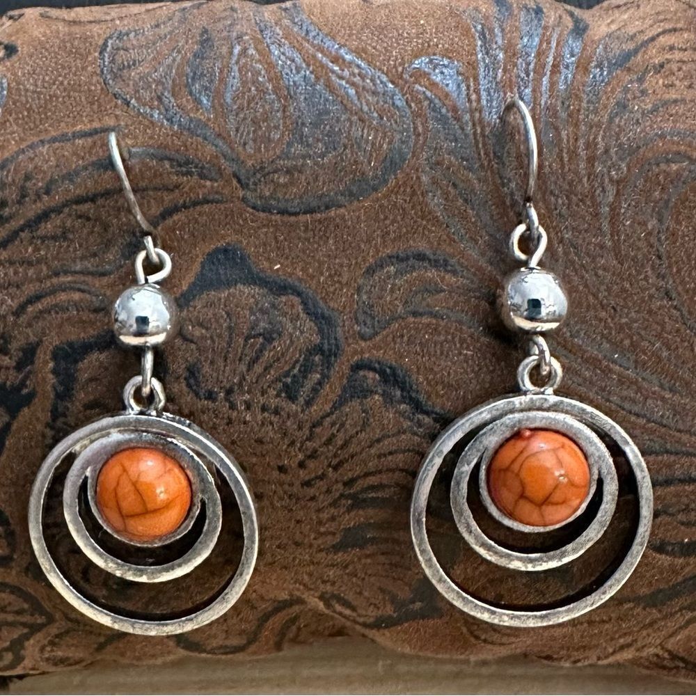 Orbital Silver and Orange Earrings with Concentric Design
